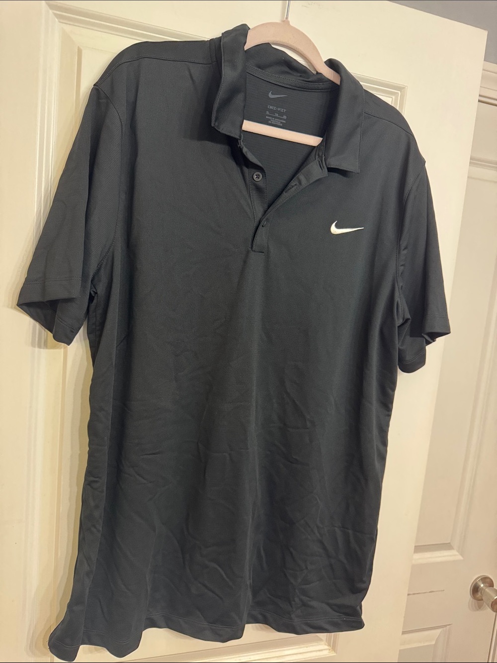 Nike Men’s Black Polo with White Swoosh